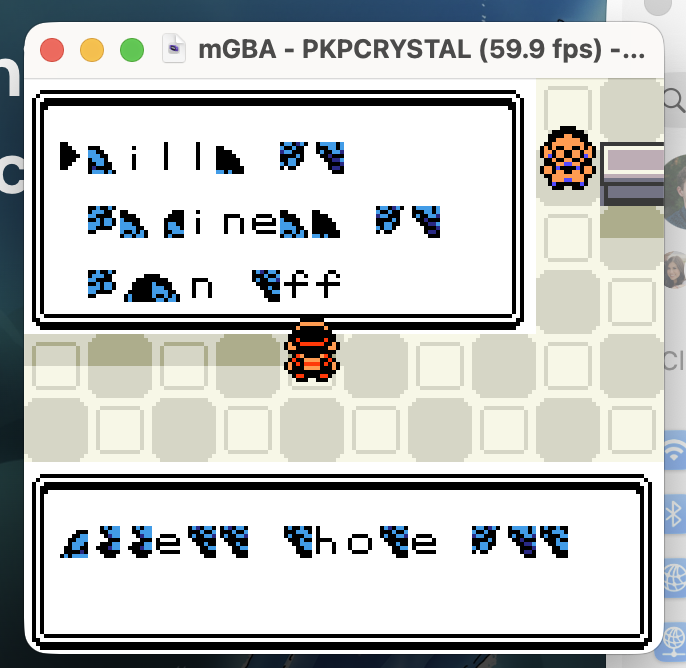 A Safari Gauntlet mGBA screenshot with corrupted menu text after a ROM hack bug